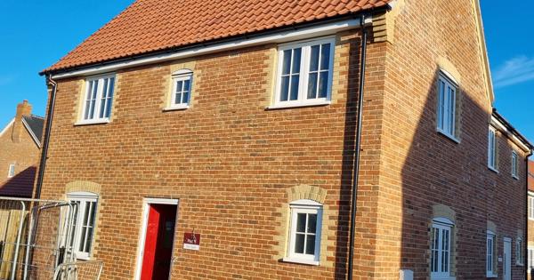 Yellow Brick House With Red Door 