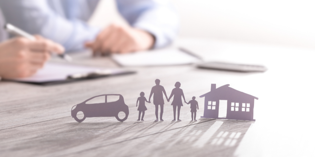 Paper Cut Cut Of A Car, Family And House Upright On A Table With Shadow
