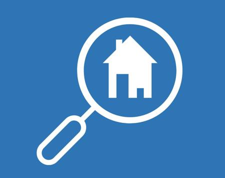 Blue Background With White House Sitting Inside A Magnifying Glass