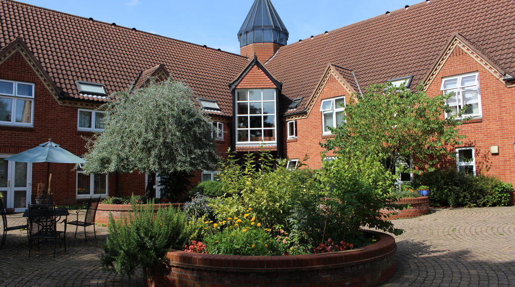 Red Brick Building Surrounded by Trees
