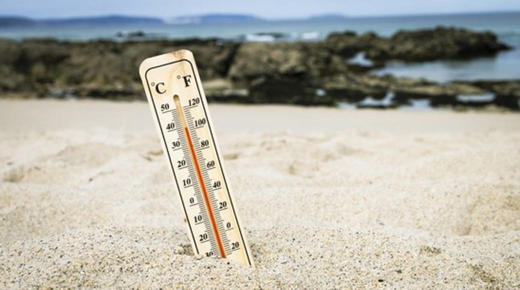 Np Thermometer On The Beach Marking High Temperatures