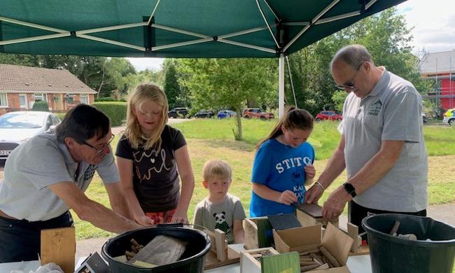 Children Making Bug Hotels